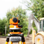 Surveyor equipment for leveling outdoors at construction of the road